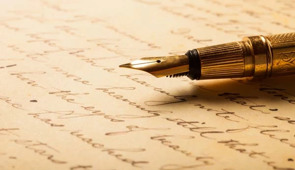 Fountain pen on letter