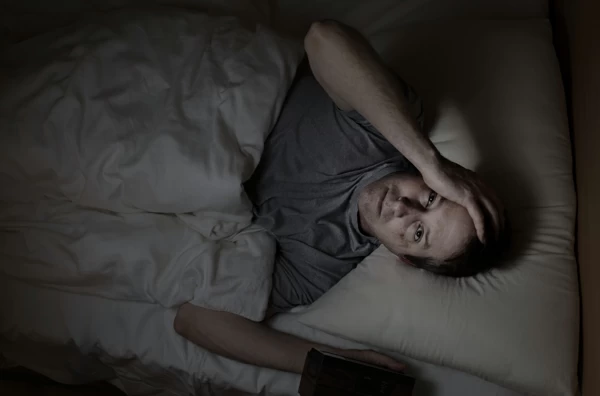 Mature man cannot fall asleep during night time